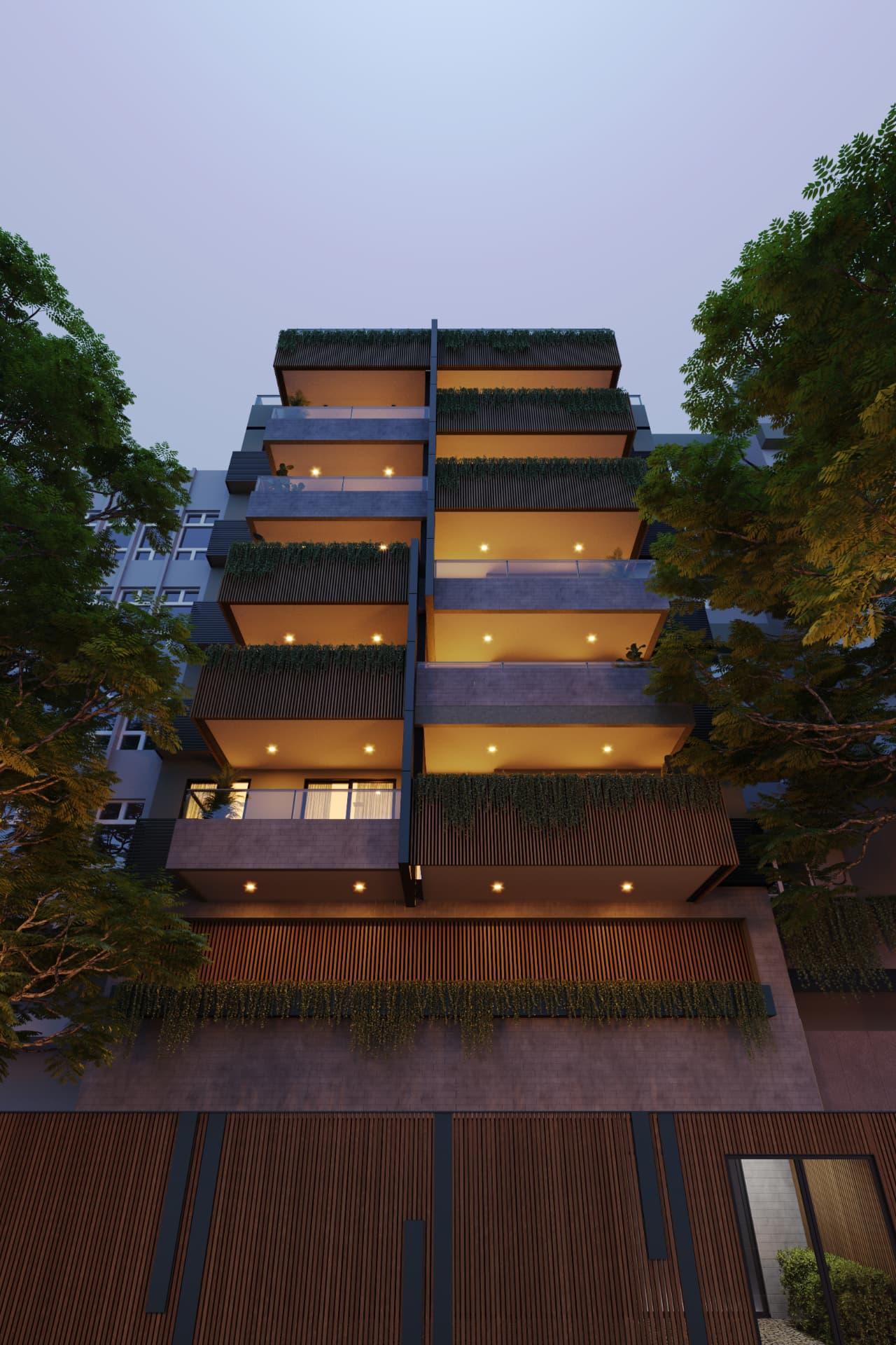 Fachada do Fevereiro Botafogo Living ao anoitecer